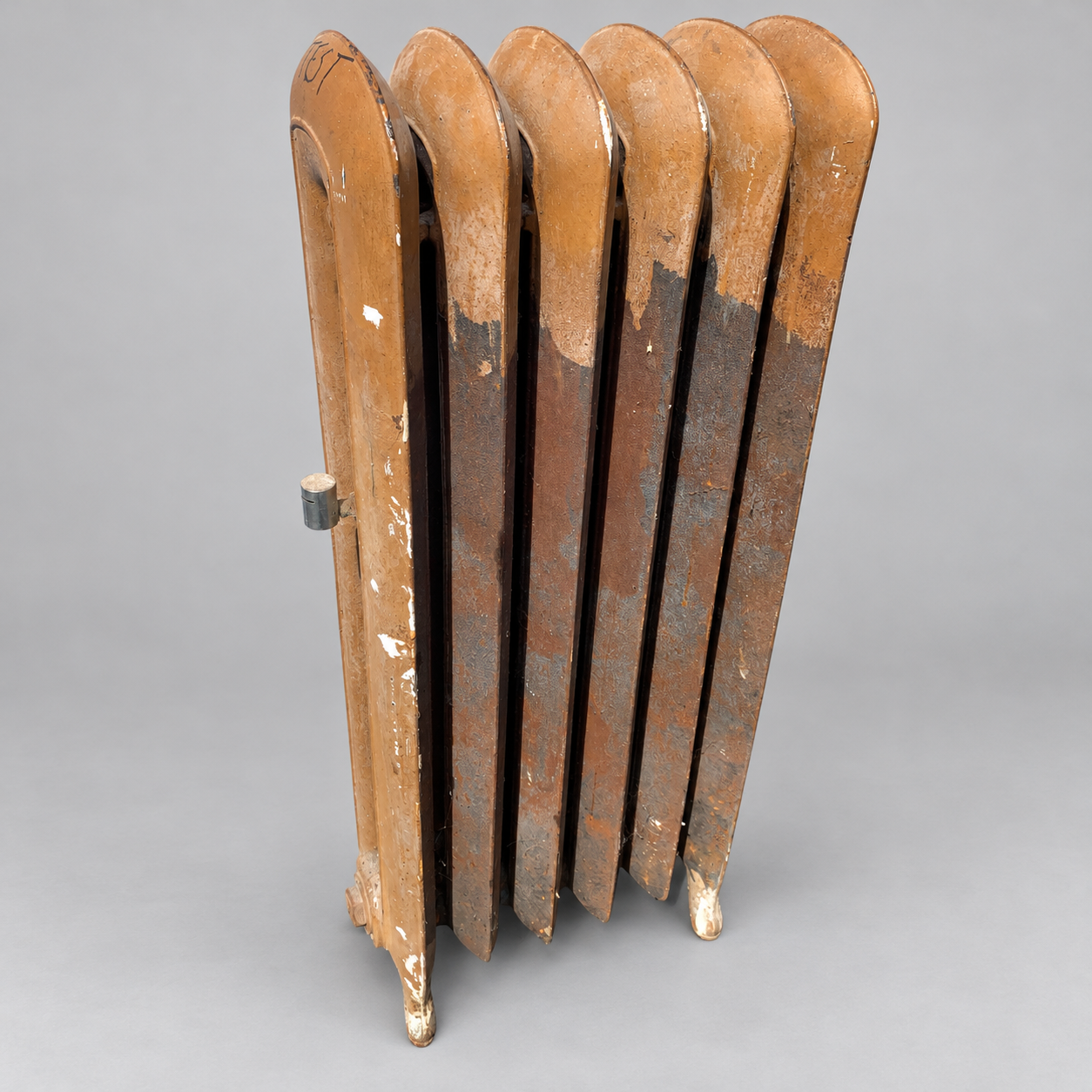 Actual radiator 311 with its worn brown paint